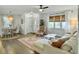 Inviting living room with hardwood floors, modern furnishings, and ample natural light throughout at 5107 Temple St, North Charleston, SC 29405