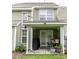 Exterior view of a back porch with a grill, furniture, and plants at 5208 Fernland Way, North Charleston, SC 29420