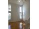 Bright living room with vaulted ceilings, lots of natural light, and hardwood floors, a delightful space at 5208 Fernland Way, North Charleston, SC 29420