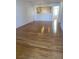 Open-concept living space with gleaming hardwood floors, perfect for entertaining and Gathering gatherings at 5208 Fernland Way, North Charleston, SC 29420