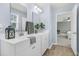 Well-lit bathroom featuring double sinks and a view of the main bedroom, offering convenience and style at 543 Wayton Cir, Moncks Corner, SC 29461