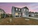Beautiful home with gray siding, and a well-kept lawn, creating a welcoming curb appeal at 543 Wayton Cir, Moncks Corner, SC 29461