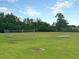 Open field with a soccer goal, bleachers, and lush green grass, perfect for outdoor activities and community gatherings at 543 Wayton Cir, Moncks Corner, SC 29461