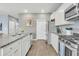 Kitchen with stainless steel appliances, granite countertops, and a large island for meal prep at 543 Wayton Cir, Moncks Corner, SC 29461