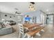 Open-concept living and dining area with hardwood floors and modern decor, perfect for entertaining or relaxing at 543 Wayton Cir, Moncks Corner, SC 29461