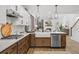 Modern kitchen with stainless steel appliances, farmhouse sink, and an open layout at 709 Alma Square Dr, Moncks Corner, SC 29461