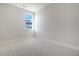Bright bedroom with plush carpet featuring a view from the window at 722 Rumbling Leaf Ln, Summerville, SC 29486