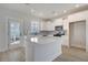 Stylish kitchen with a large center island, stainless steel appliances, and modern backsplash at 722 Rumbling Leaf Ln, Summerville, SC 29486