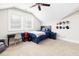 Bedroom featuring a blue bed, ceiling fan, and workspace at 734 Canopy Cove Cv, Charleston, SC 29412