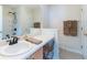 Bathroom featuring a vanity with a sink, ample counter space, and a shower/tub combination at 7919 New Ryder Rd, North Charleston, SC 29406