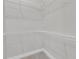 Interior view of a walk-in closet with white wire shelving and base molding with carpet floors at 810 Gentle Breeze Dr, Summerville, SC 29486