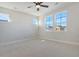 This bedroom has plush carpet and lots of natural light from the many windows at 812 Gentle Breeze Dr, Summerville, SC 29486