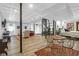 Finished basement featuring living area, dining area, and bedroom with a spiral staircase at 886 White Point Blvd, Charleston, SC 29412