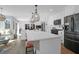 Modern kitchen with stainless steel appliances and an island with bar stool seating at 886 White Point Blvd, Charleston, SC 29412