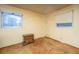 Tan bedroom with a dresser under one window and another window with pulled shade at 1024 Locksley Dr, Charleston, SC 29407