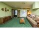 Bright living room with a seamless flow, blending retro charm with modern living at 1024 Locksley Dr, Charleston, SC 29407