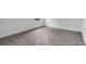 Empty carpeted bedroom ready for personalization, offering a neutral palette and ample space at 1058 Marsh Harrier Dr # 15-7P, Ravenel, SC 29470