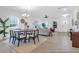 Bright living room featuring modern furniture, large windows, and neutral decor for a welcoming atmosphere at 1058 Marsh Harrier Dr # 15-7P, Ravenel, SC 29470