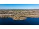Dramatic aerial of a stunning lake, with a tree-covered island and reflections at 105 Goose Creek Dr, Goose Creek, SC 29445