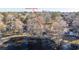 Aerial shot of a home, nestled among moss-draped trees and tranquil lake waters at 105 Goose Creek Dr, Goose Creek, SC 29445