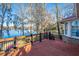 Back deck adjoins the house and provides panoramic views of the scenic lake at 105 Goose Creek Dr, Goose Creek, SC 29445