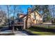 Back of house features a deck and scenic lake views, complementing the charming architecture at 105 Goose Creek Dr, Goose Creek, SC 29445