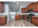 Spacious kitchen with wood cabinets, stainless steel appliances, and open layout at 106 Willet Dr, Summerville, SC 29485