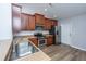 Well-equipped kitchen with stainless steel appliances, wood cabinets, and a double-basin sink at 106 Willet Dr, Summerville, SC 29485