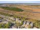 Panoramic aerial view showcasing the neighborhood, winding waterways, and marshland at 1122 St Pauls Parrish Ln, Johns Island, SC 29455