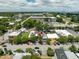 Charming aerial view of the neighborhood showcasing businesses, landscaping, and street parking at 1195 Marquis Rd, North Charleston, SC 29405