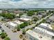 Attractive aerial view of neighborhood with commercial buildings, parking, and neatly maintained landscaping at 1195 Marquis Rd, North Charleston, SC 29405