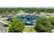 Aerial view showing a playground, ballfield, building, and parking in the area at 1195 Marquis Rd, North Charleston, SC 29405