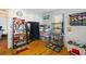 Playful bedroom with hardwood floors, Snoopy decor, and ample storage space at 1195 Marquis Rd, North Charleston, SC 29405