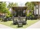 Inviting outdoor venue with a stage, rocking chairs and seating area at 1195 Marquis Rd, North Charleston, SC 29405