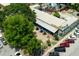 Exterior aerial view of restaurant with outdoor seating, mural, parking lot, and inviting atmosphere at 1195 Marquis Rd, North Charleston, SC 29405