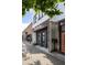 Street view of a restaurant and retail building with tables outside at 1195 Marquis Rd, North Charleston, SC 29405