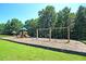 Community playground featuring swings and slides for entertainment at 125 Guinness Ln, Moncks Corner, SC 29461