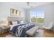 Stylized bedroom with a large bright window view, a ceiling fan and a cushioned bench at 130 River Landing Dr # 7309, Charleston, SC 29492
