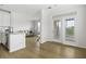 Open floorplan kitchen and living room area with light hardwood flooring at 130 River Landing Dr # 7309, Charleston, SC 29492