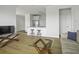 Open floorplan kitchen, and living room area with hardwood flooring at 130 River Landing Dr # 7309, Charleston, SC 29492
