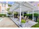 Charming outdoor patio with comfortable seating and overhead pergola at 130 River Landing Dr # 7309, Charleston, SC 29492