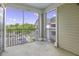 Screened patio with a view of the community's parking lot and complex landscaping at 130 River Landing Dr # 7309, Charleston, SC 29492