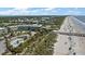 Aerial view of a beachfront condominium near a sandy beach and a community pool at 1300 Ocean Blvd # 102 A, Isle of Palms, SC 29451