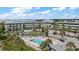 Aerial view featuring the complex pool, amenities, landscaping, and its convenient access to the nearby beach at 1300 Ocean Blvd # 102 A, Isle of Palms, SC 29451