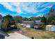 Wide aerial view of the property showcasing the backyard, outbuildings, and surrounding neighborhood at 1328 Erckmann Dr, Mount Pleasant, SC 29464