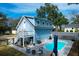 View of the backyard featuring a swimming pool, patio, deck, and seating area at 1328 Erckmann Dr, Mount Pleasant, SC 29464