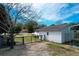 Backyard features a boat covered in tarp next to a storage shed with a covered carport at 1328 Erckmann Dr, Mount Pleasant, SC 29464