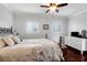 Bright bedroom with natural light, a comfortable bed, and hardwood floors at 1328 Erckmann Dr, Mount Pleasant, SC 29464