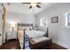 Comfortable bedroom with ample lighting, a ceiling fan, and neutral color palette at 1328 Erckmann Dr, Mount Pleasant, SC 29464