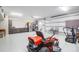 Well-organized garage featuring cabinets, epoxy flooring, and an abundance of workspace at 1328 Erckmann Dr, Mount Pleasant, SC 29464